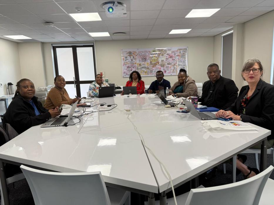 Day 1 people in a meeting