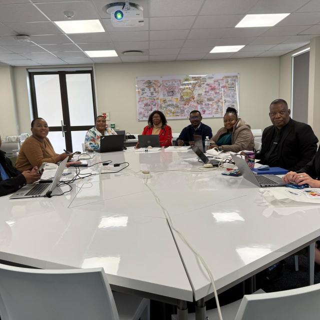 Day 1 people in a meeting